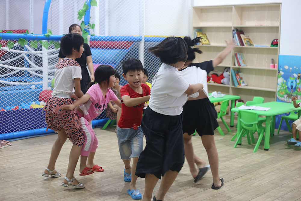 Children of parent workers having fun at a CFS