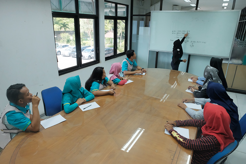 Young workers in Indonesia receive training as part of a youth development programme